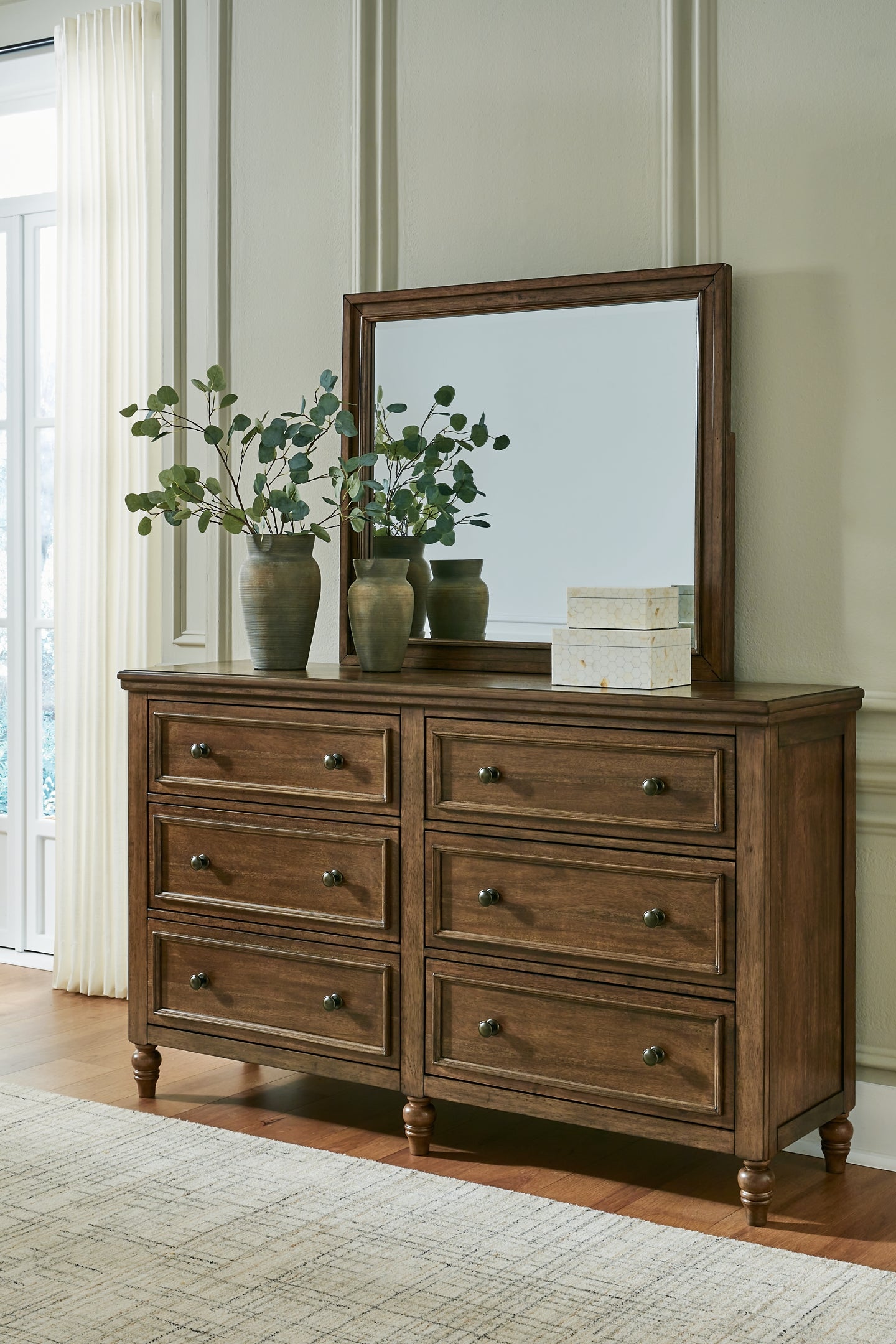 Sturlayne California King Upholstered Panel Bed, Dresser, Mirror and Nightstand